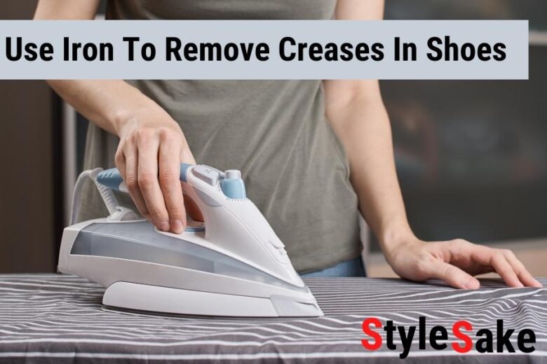 Using iron to remove ceases in shoes